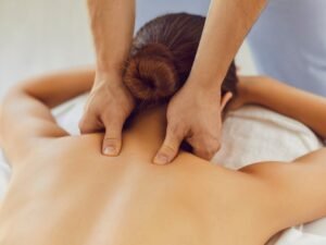 woman on massage table for neck massage
