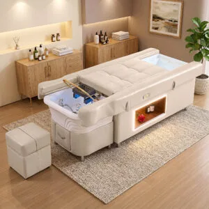 Cama de tratamiento Headspa Foot Deluxe en beige en un salón de spa amueblado
